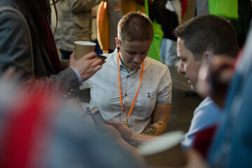 Speakers talking with audience