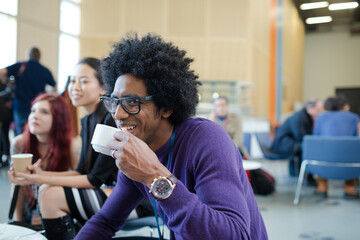People drinking coffee during conference break