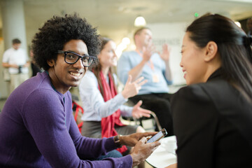 People talking in hall during conference break