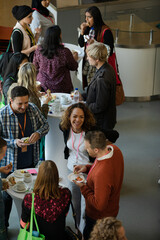 Obraz na płótnie Canvas People eating during conference break