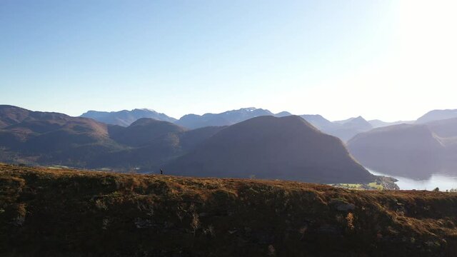 Orbiting a person running on a mountain in Volda, Norway.