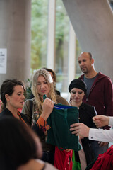 People waiting in hall of auditorium