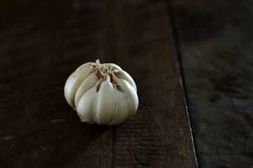 Bunch of fresh garlic on the wooden table