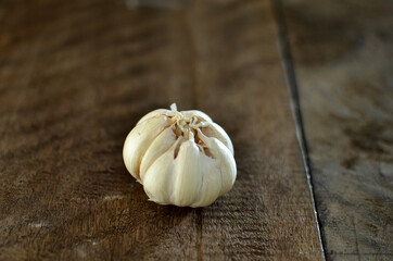 Bunch of fresh garlic on the wooden table