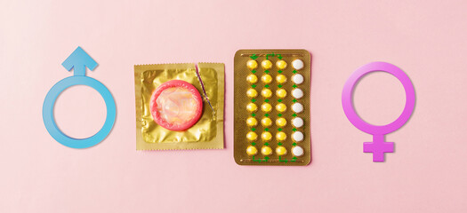 World sexual health or Aids day, condom on wrapper pack, contraceptive pills blister hormonal birth...