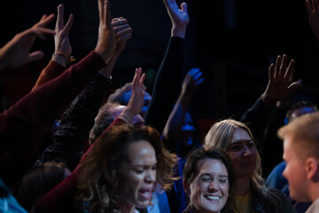 Audience reaching for and talking with speakers