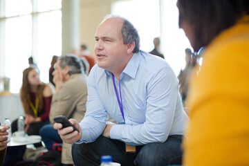 Obraz premium People talking during conference break