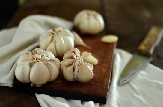 Bunch of Fresh garlic on wooden table