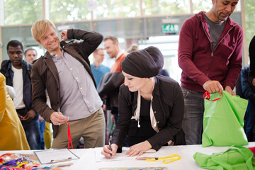 People signing up for conference