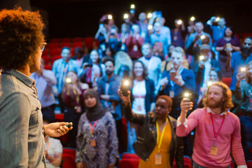 Male speaker talking to audience