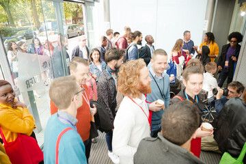 Obraz premium People entering auditorium hall