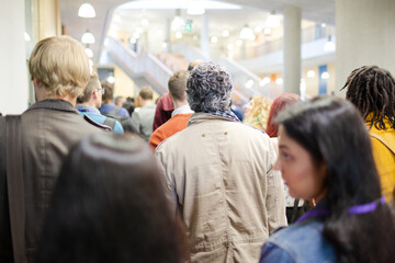 Fototapeta premium People leaving auditorium hall