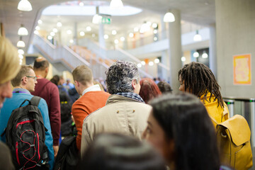 People leaving auditorium hall