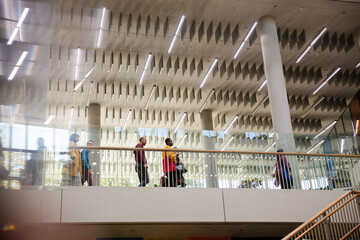 People walking in auditorium hall