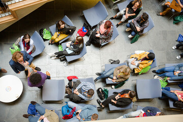 HIgh angle view of people attending conference