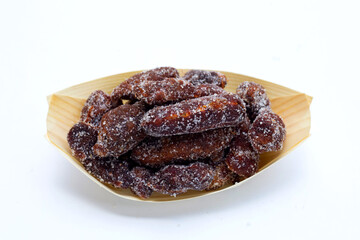 Spicy tamarind mixed with granulated sugar, chili and salt