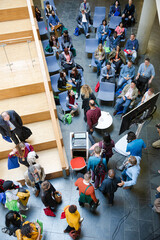 Obraz premium High angle view of people attending conference