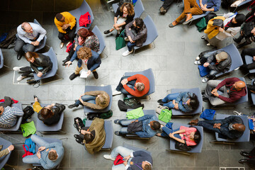 Fototapeta premium High angle view of people attending conference