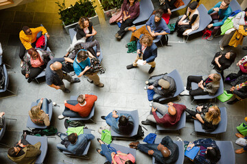 High angle view of people attending conference