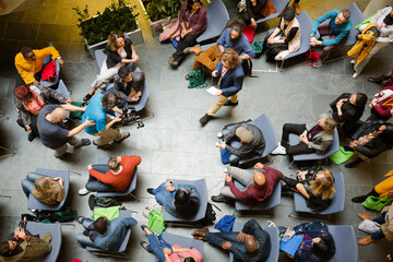 Fototapeta premium High angle view of people attending conference