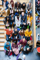 Obraz premium High angle view of people attending conference