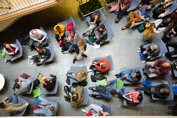 High angle view of people attending conference