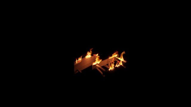 Fire on the wooden bench lying on the ground, burning fire in the black background, FX elements for compositing