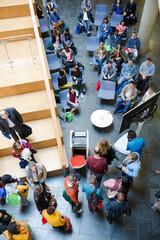 High angle view of people attending conference