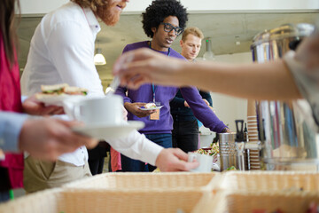People drinking coffee during conference break