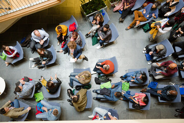 High angle view of people attending conference