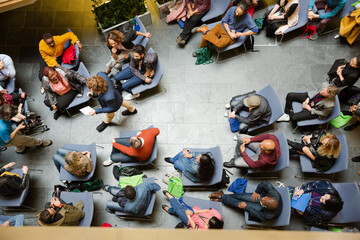 Fototapeta premium High angle view of people attending conference