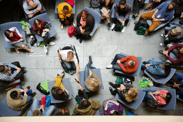Fototapeta premium Male speaker in wheelchair talking to audience