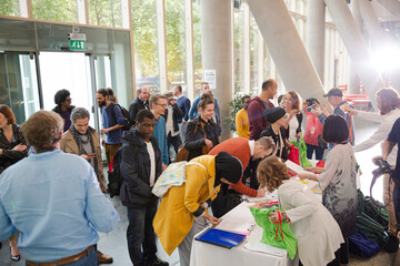 Fototapeta premium People signing up for conference