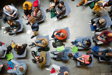 High angle view of people attending conference