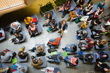 High angle view of people attending conference