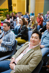 Obraz premium Smiling man in audience