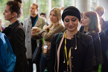 Smiling businesswoman in conference hall