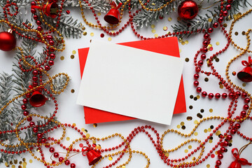 mock up christmas card. frame from fir branches and Christmas decorations. flat lay. invitation. congratulation 