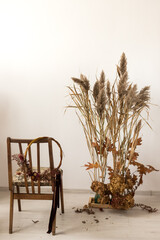 The pampass grass with wood chair