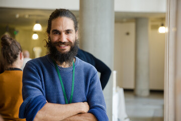 Portrait of smiling, confident male speaker