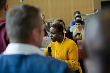 Female speaker talking to audience