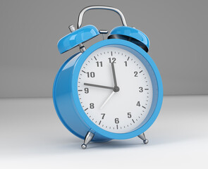Blue Alarm clock on a white desk