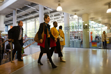 Naklejka premium People going upstairs