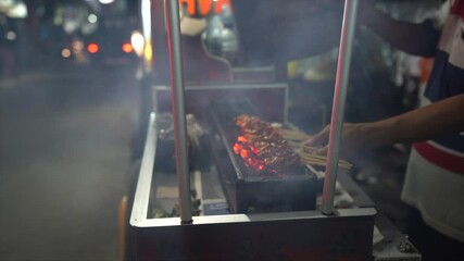 A person preparing Ramen Street food in Jakarta, Indonesia