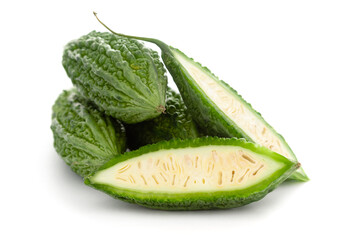 Close-Up of Organic Indian bitter gourds (Momordica charantia) or fresh Green Karela, cross section...