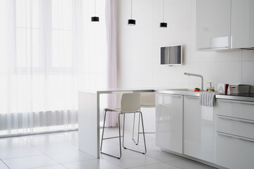 Studio room interior design with white chairs, TV and window