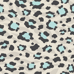 The leopard is trendy. Seamless pattern with wild animal blue and black spots for modern fabrics, textiles, throw pillows, bedding. Gray background. 