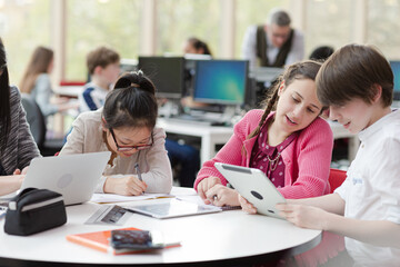 Students sitting at table