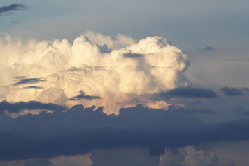 white cloud against a black rain cloud