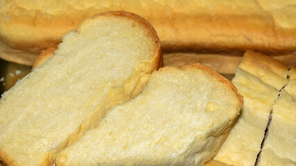 Artisan Loaf Of White Bread With Slices Stock Photo
